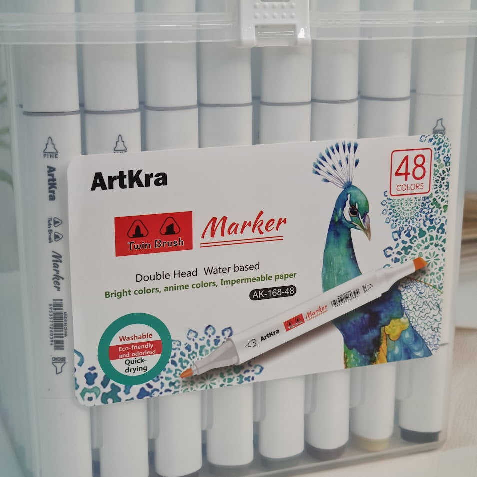 Front view of the Usmile Toys 'ArtKra Marker' 48-piece set, showcasing numerous colorful marker pens neatly arranged in a portable clear case with a handle." www.usmile.toys